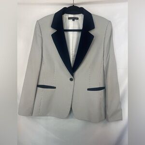 Preston and York sear sucker blacker. Gray and white stripe and navy lapel.